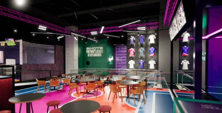 Inside the top floor of Toca Social. Soccer jerseys, tables, decor